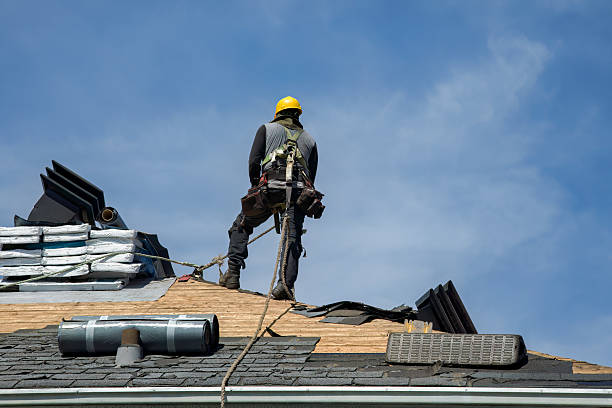 Professional Roof Replacement technician working in Townsend, MA